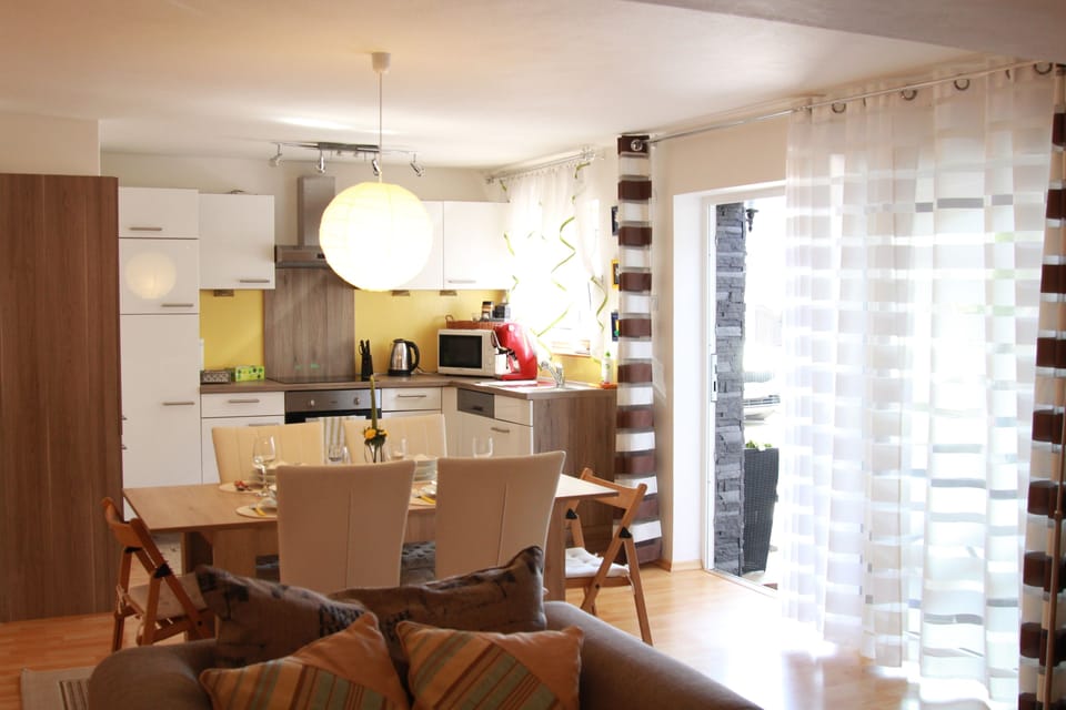 Comfort Apartment | Private kitchen | Full-size fridge, microwave, stovetop, dishwasher