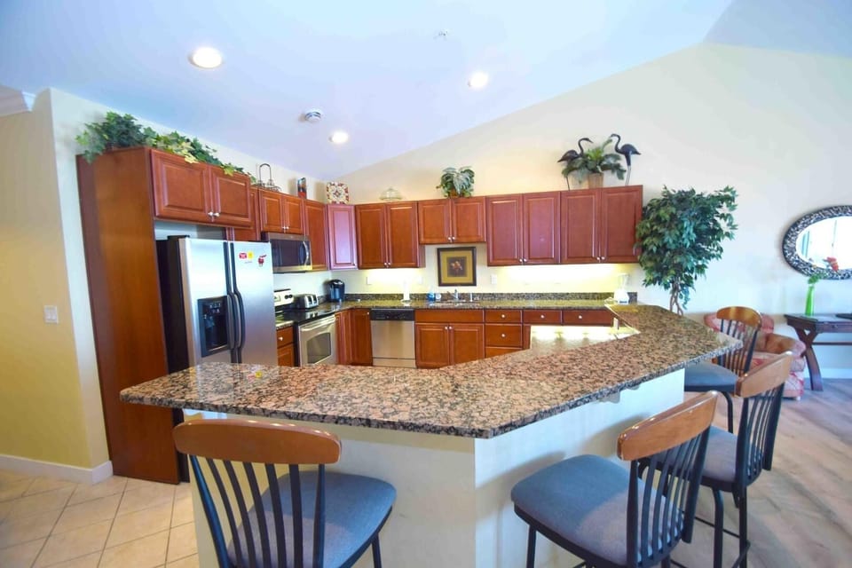 Condo, 4 Bedrooms | Private kitchen | Fridge, microwave, dishwasher, coffee/tea maker