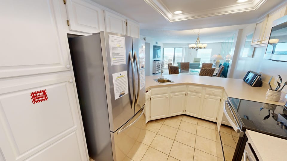 Condo, 2 Bedrooms | Private kitchen | Fridge, microwave, oven, dishwasher