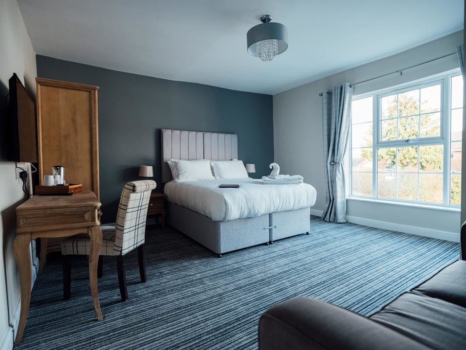 Deluxe Double or Twin Room, 1 King Bed with Sofa bed | Living area | 42-inch LED TV with digital channels, TV