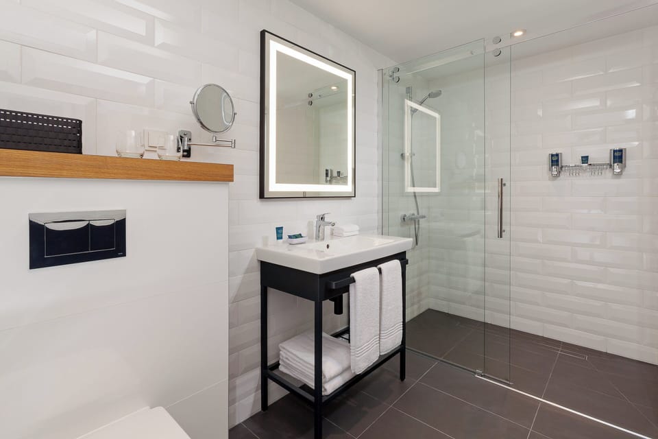 Shower, free toiletries, hair dryer, towels