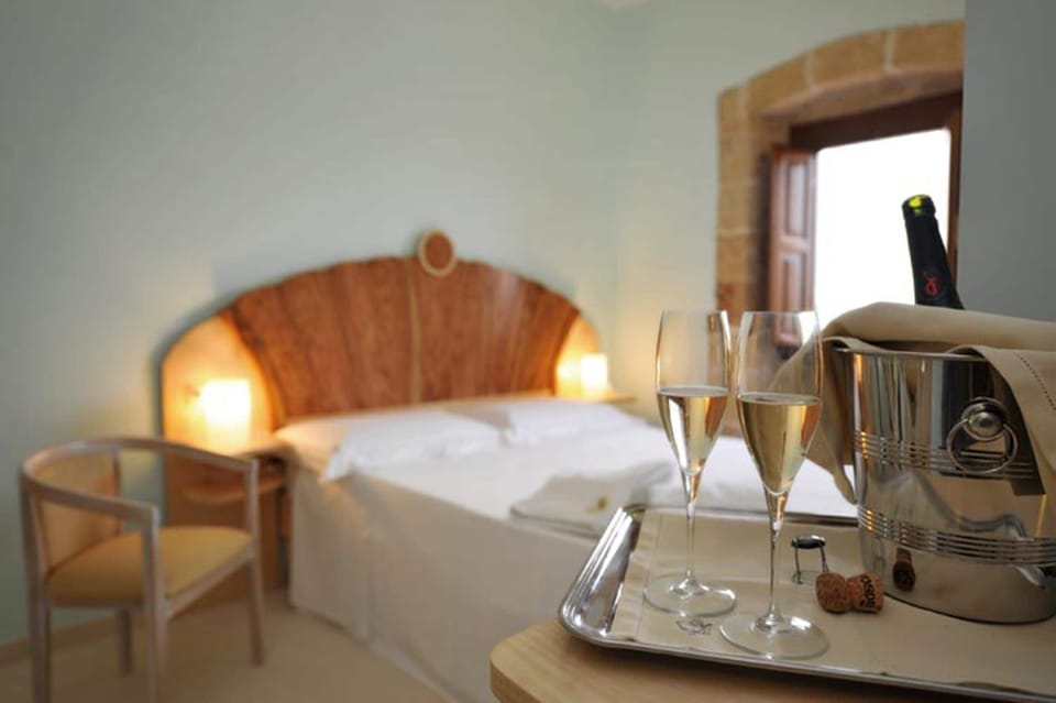 Superior Double Room | Minibar, in-room safe, desk, laptop workspace