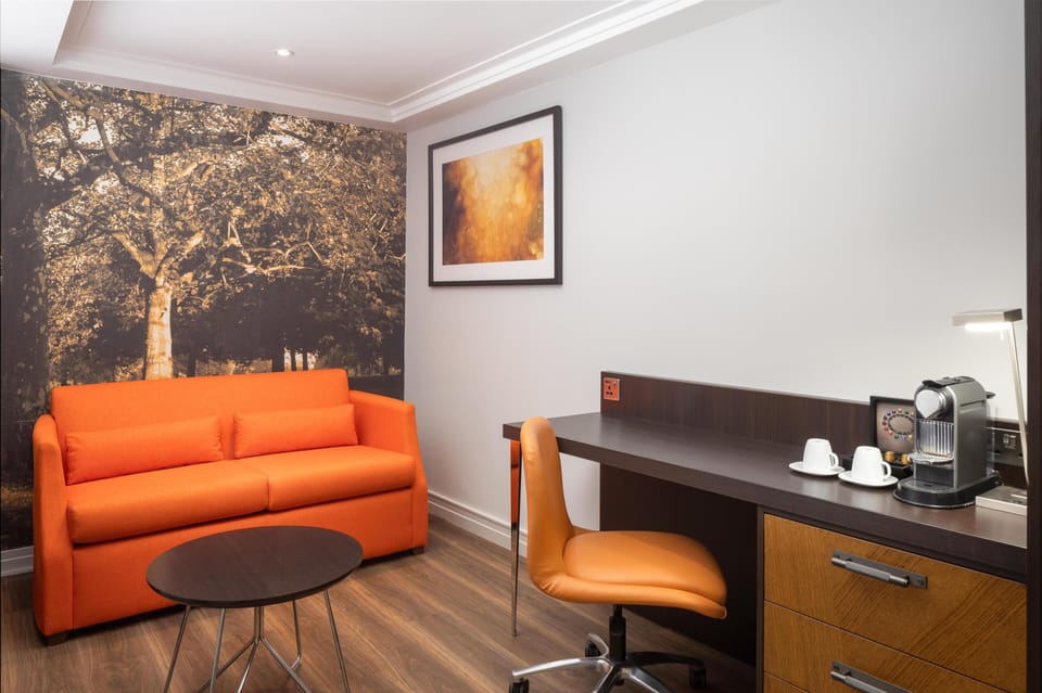 Junior Suite, 1 King Bed | In-room safe, desk, laptop workspace, blackout drapes