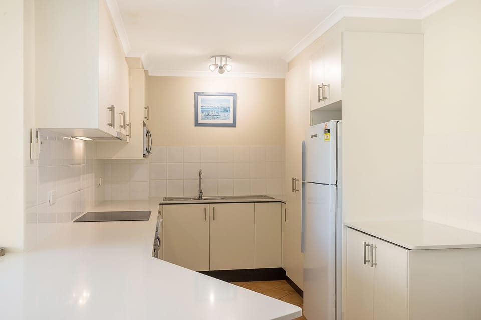 2 Bedroom Apartment Accessible | Private kitchen | Full-size fridge, microwave, oven, stovetop