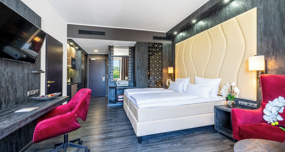Standard Double Room (Lake Side) | Minibar, in-room safe, desk, laptop workspace