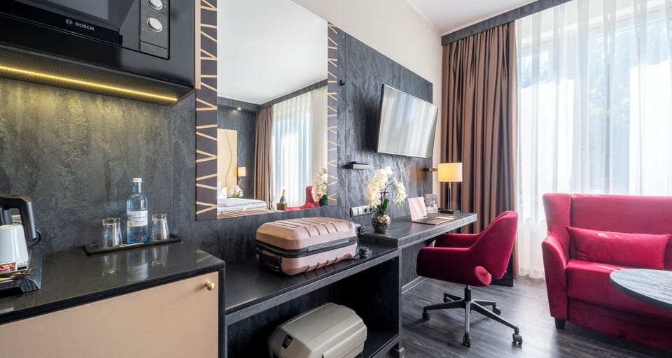 Comfort Double Room (Lake Side) | Minibar, in-room safe, desk, laptop workspace