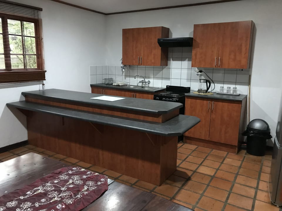 Family Chalet | Private kitchen | Fridge, microwave, stovetop, coffee/tea maker