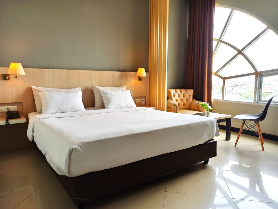 Executive Double Room | Desk, blackout drapes, iron/ironing board (on request), WiFi (free)