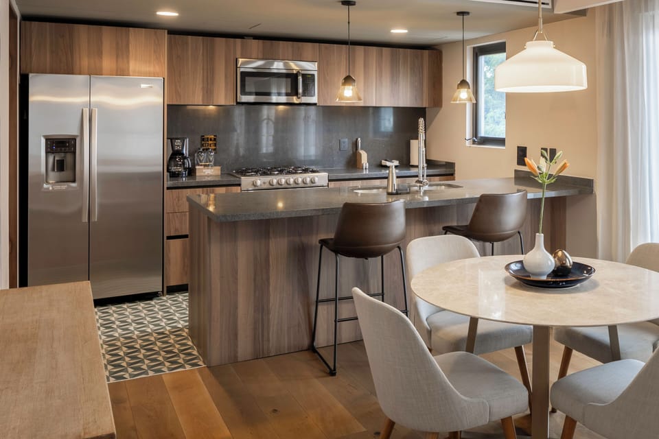 Luxury Suite, Multiple Beds, Non Smoking, City View | Private kitchen | Coffee/tea maker, full-size fridge, microwave, oven