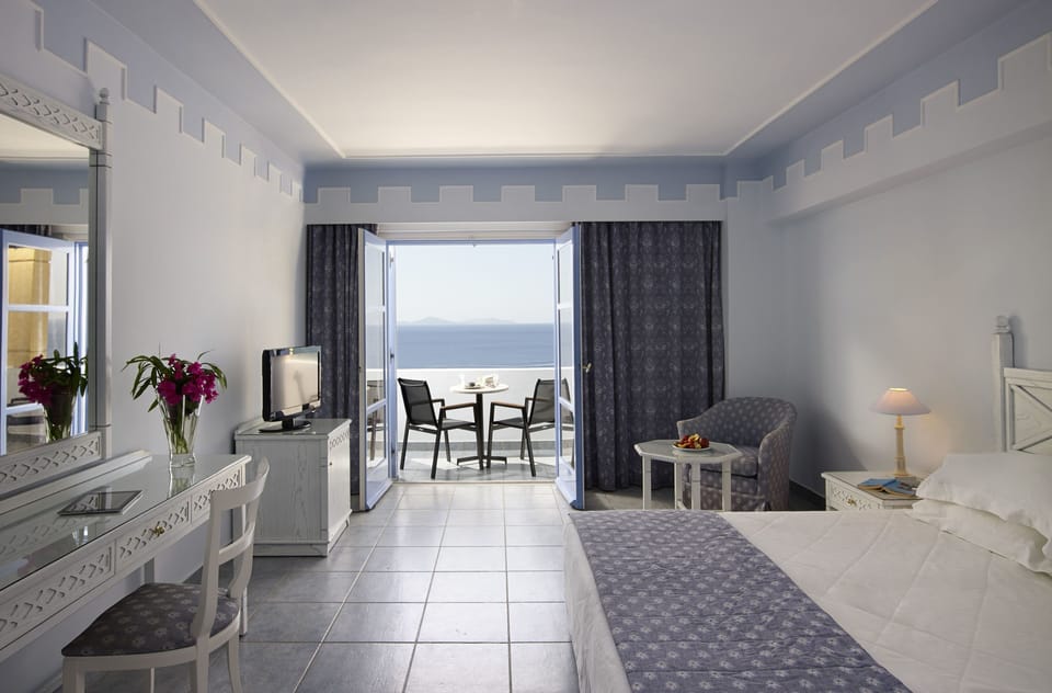 Twin Room, Sea View | Free minibar, in-room safe, desk, soundproofing