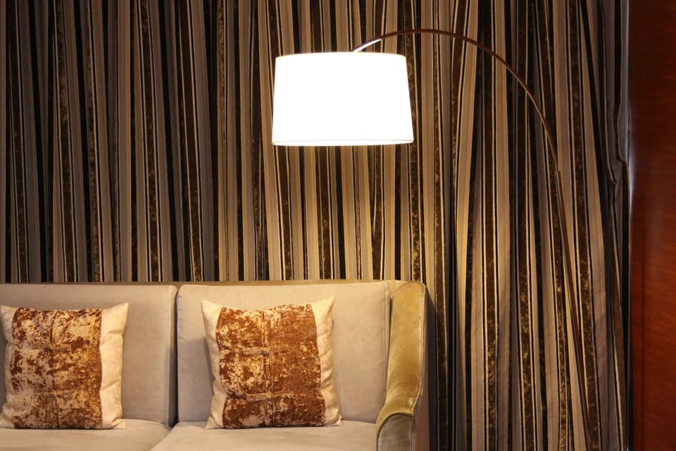 Premium bedding, down comforters, minibar, in-room safe