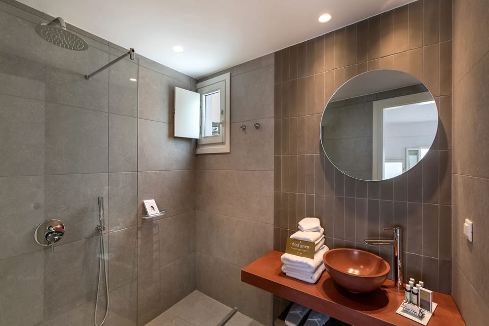 Double Room, Sea View (Sunset) | Bathroom | Shower, free toiletries, hair dryer, bathrobes