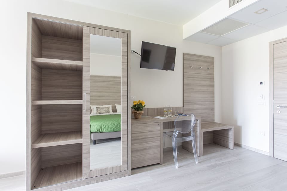 Quadruple Room | Premium bedding, minibar, in-room safe, desk