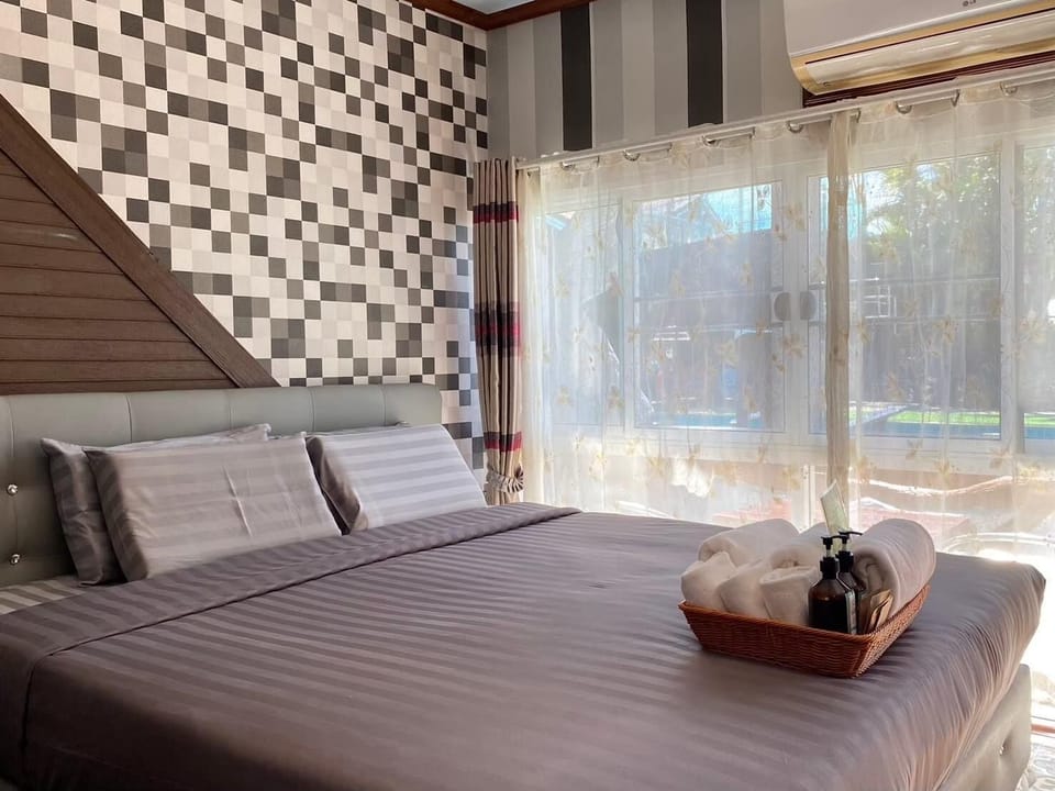 Deluxe Room with Pool Access  | Blackout drapes, free WiFi, bed sheets