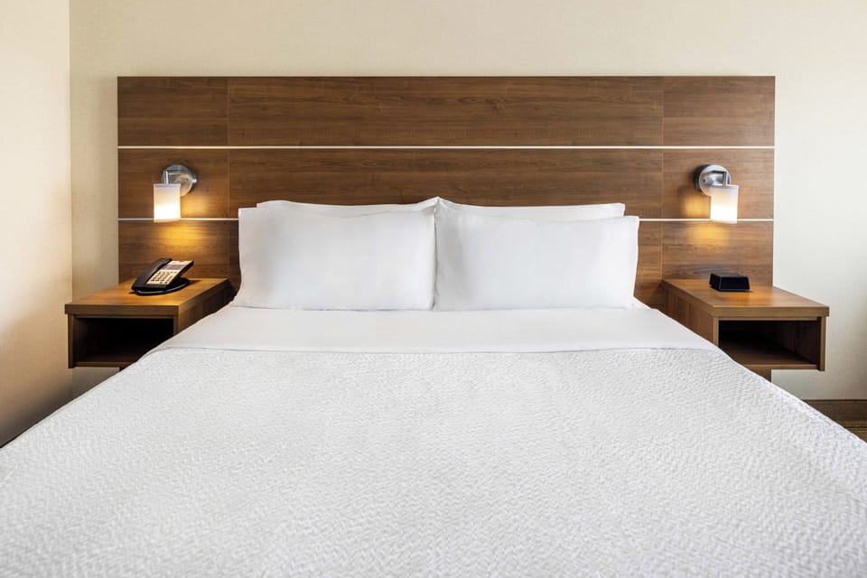 Hypo-allergenic bedding available, down comforters, desk