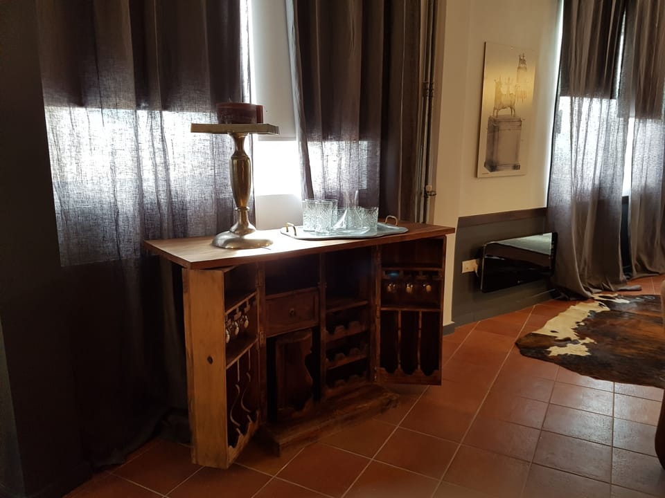 Deluxe Apartment | Living area | Flat-screen TV