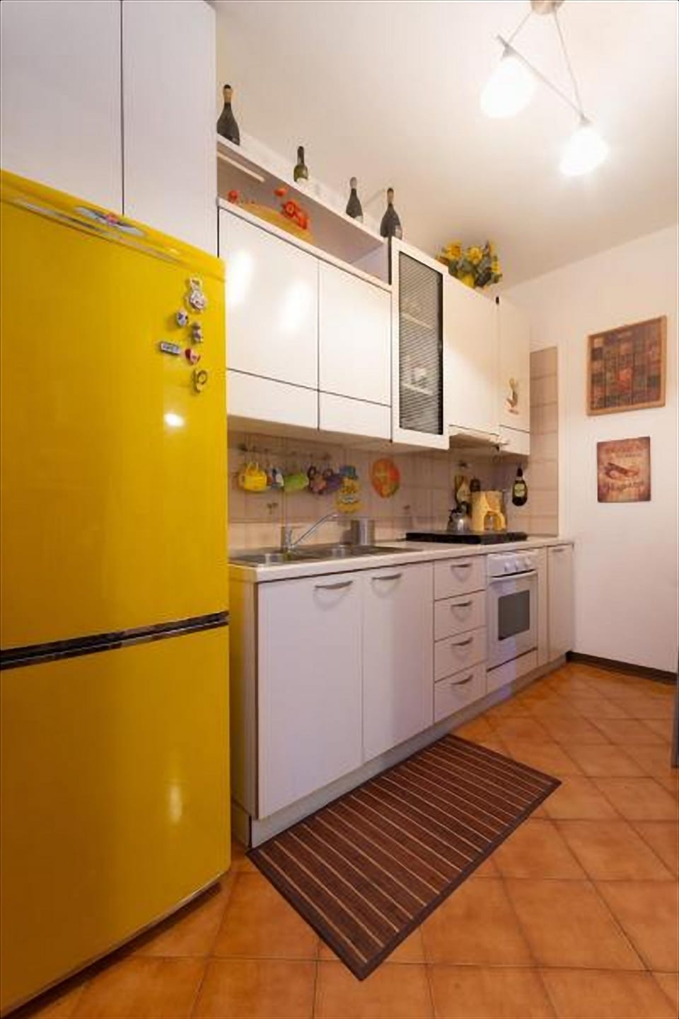 Apartment, 2 Bedrooms | Private kitchen | Full-size fridge, stovetop