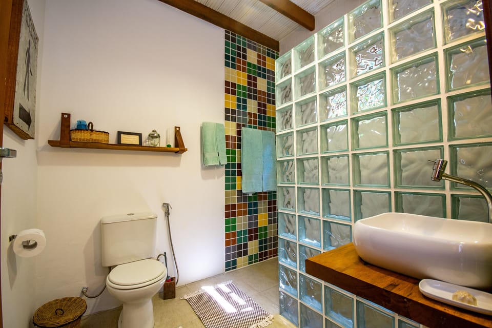 Design Chalet, 1 Bedroom, Balcony, Ocean View | Bathroom | Combined shower/tub, free toiletries, bathrobes, towels