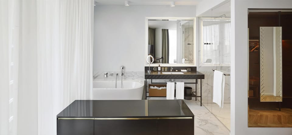 Free toiletries, hair dryer, heated floors (bathroom), towels
