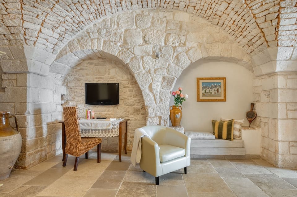 Junior Suite, Pool View (Trullo Verga) | In-room safe, blackout drapes, soundproofing, free WiFi