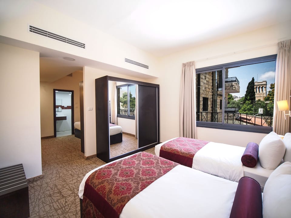 Standard Quadruple Room | In-room safe, desk, laptop workspace, soundproofing