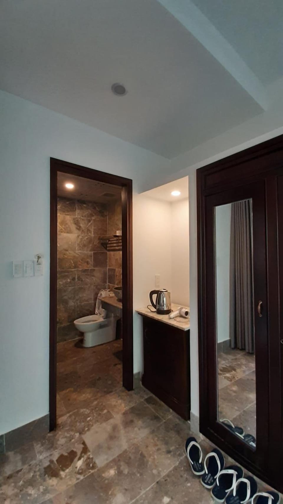 Shower, free toiletries, hair dryer, slippers
