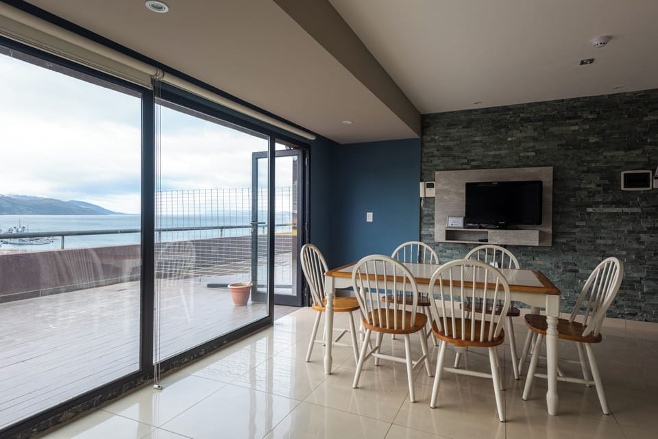 Apartment (Krund) | Living area | 32-inch LED TV with cable channels, pay movies, offices