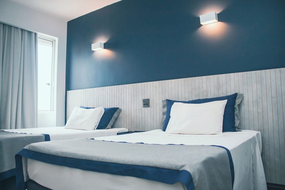Junior Room, 2 Twin Beds | Minibar, in-room safe, blackout drapes, free WiFi