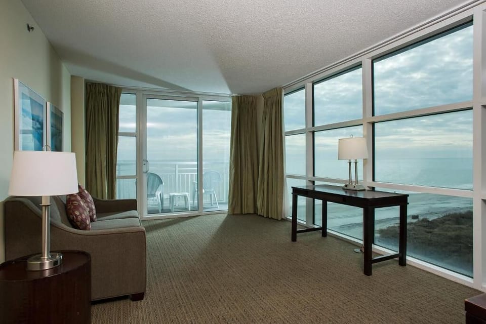 Premium Suite, 3 Bedrooms, Ocean View | Living room | 40-inch flat-screen TV with cable channels, TV