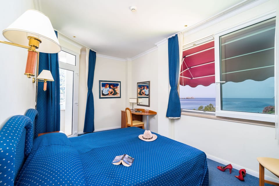 Suite, Balcony, Sea View | In-room safe, desk, free cribs/infant beds, free rollaway beds