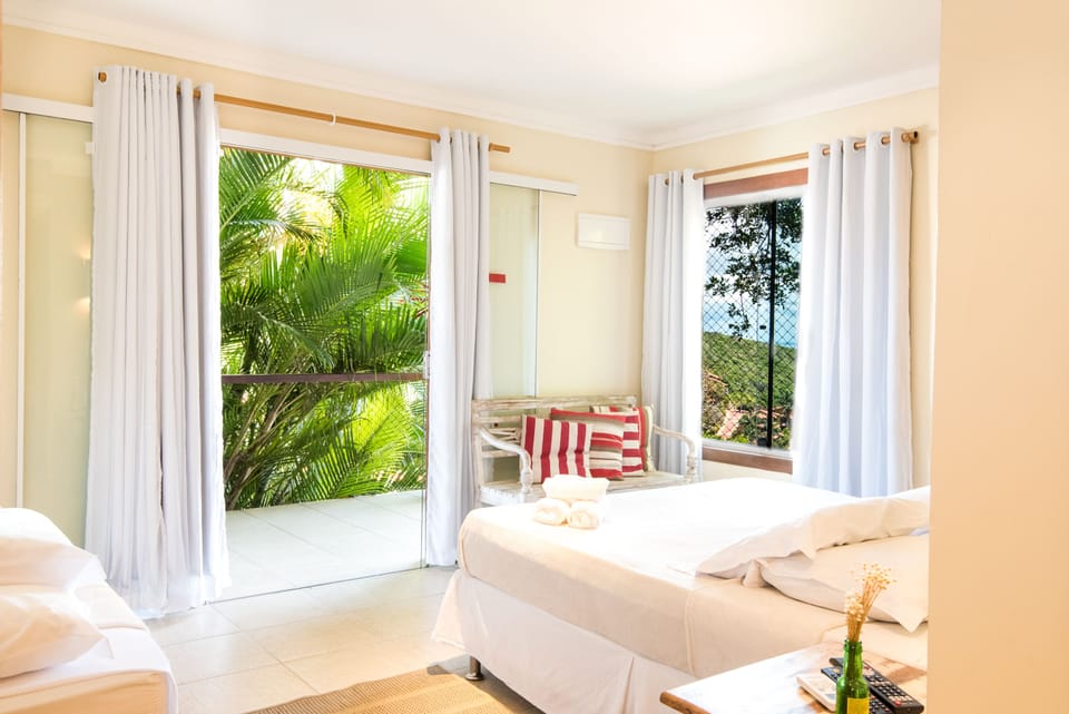 Triple Room, Jetted Tub, Sea View | Minibar, blackout drapes, free WiFi, bed sheets