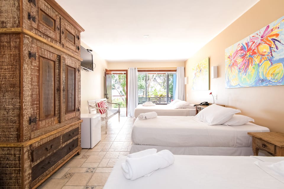 Premium Quadruple Room, Jetted Tub, Ocean View | Minibar, blackout drapes, free WiFi, bed sheets