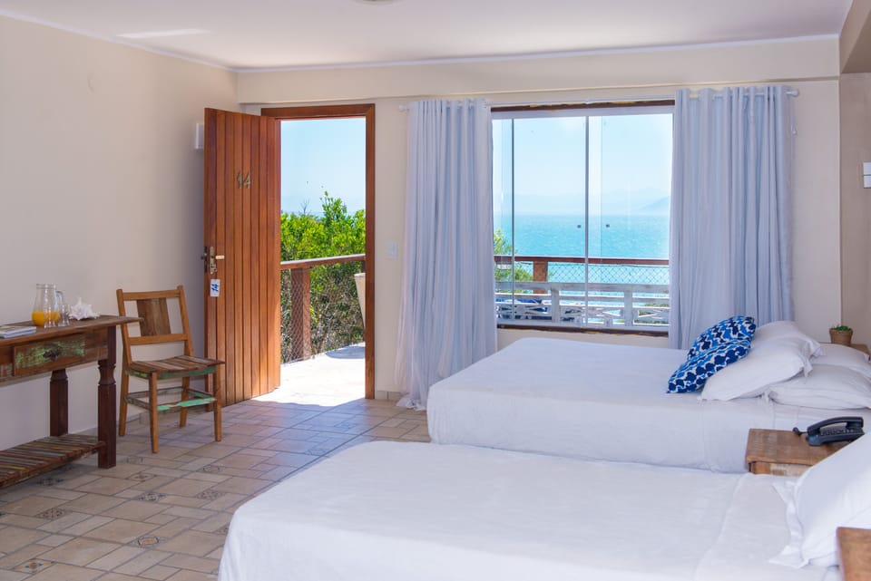 Premium Quadruple Room, Jetted Tub, Ocean View | Minibar, blackout drapes, free WiFi, bed sheets
