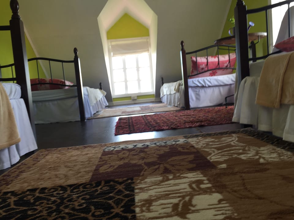 Family Room (Attic) | Down comforters, minibar, individually decorated, individually furnished