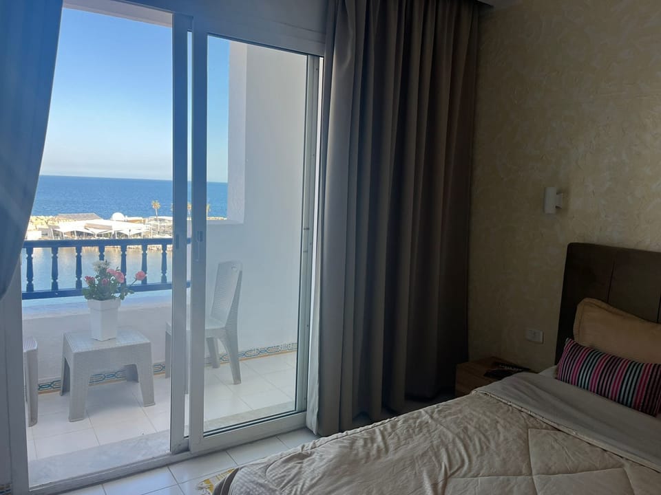 Double Room with Balcony | In-room safe, blackout drapes, free cribs/infant beds, free WiFi