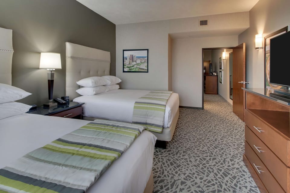 Pillowtop beds, desk, laptop workspace, blackout drapes