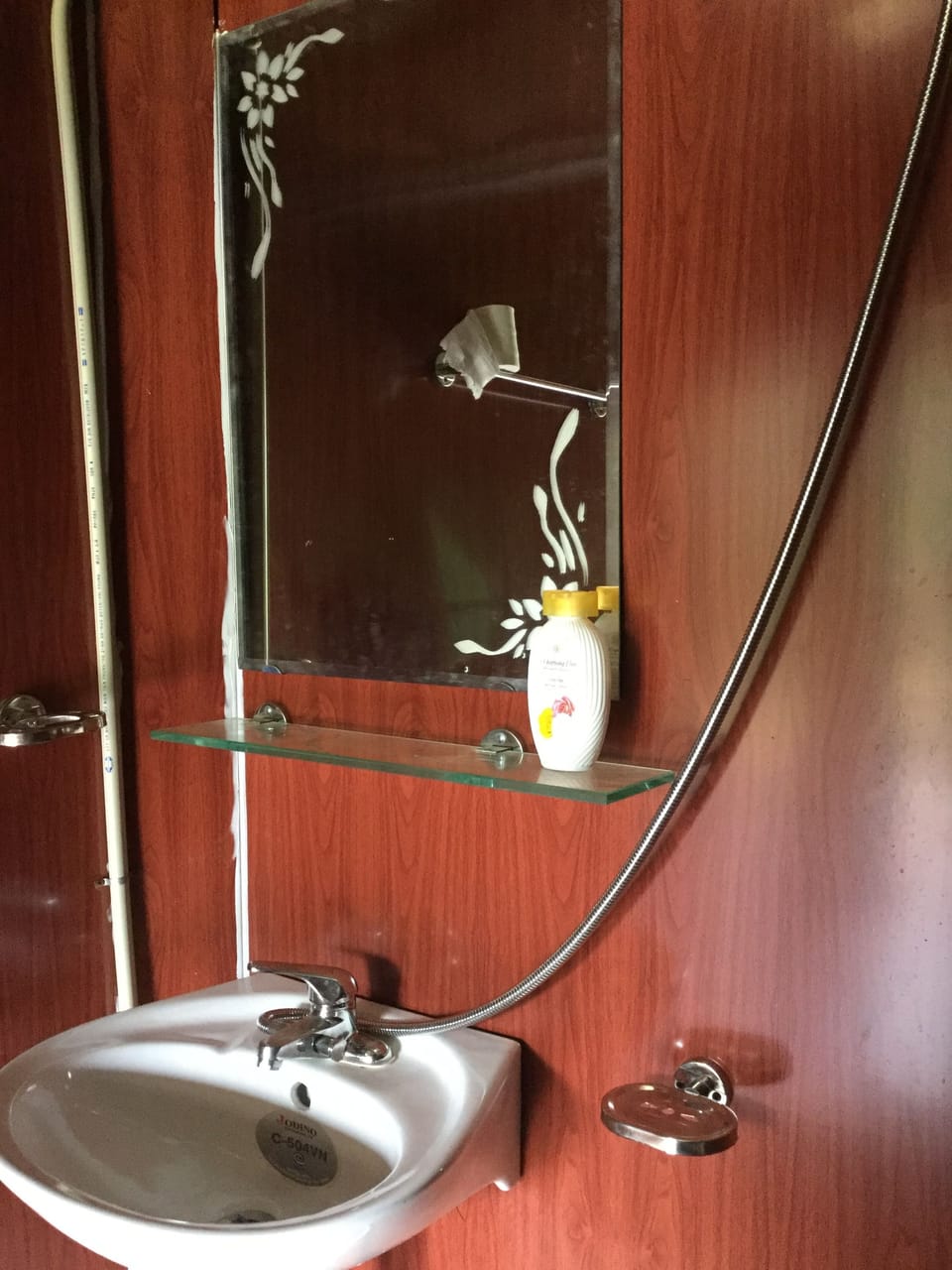 Shower, hydromassage showerhead, designer toiletries, slippers