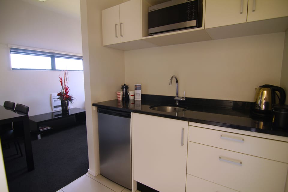 Economy Suite, 2 Bedrooms | Private kitchen | Coffee/tea maker, microwave, electric kettle
