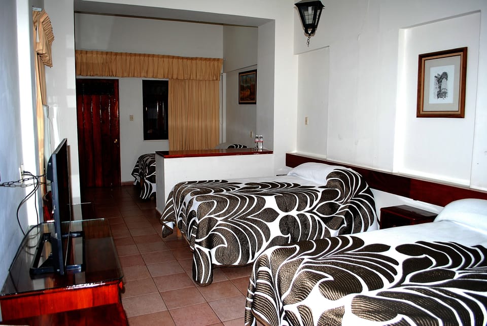 Economy Triple Room, Multiple Beds, Non Smoking | Blackout drapes, free WiFi, bed sheets