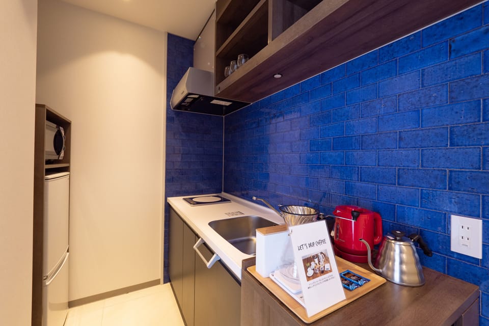 Ocean View Terrace Deluxe A | Private kitchen | Fridge, microwave, stovetop, dishwasher