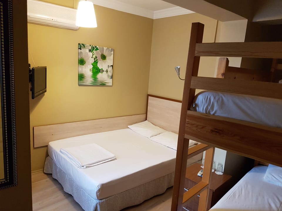 Family Quadruple Room, 1 Bedroom | In-room safe, free WiFi, bed sheets