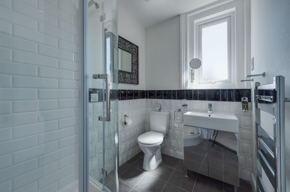 Executive King with shower (no bath)  | Bathroom | Designer toiletries, hair dryer, towels, soap