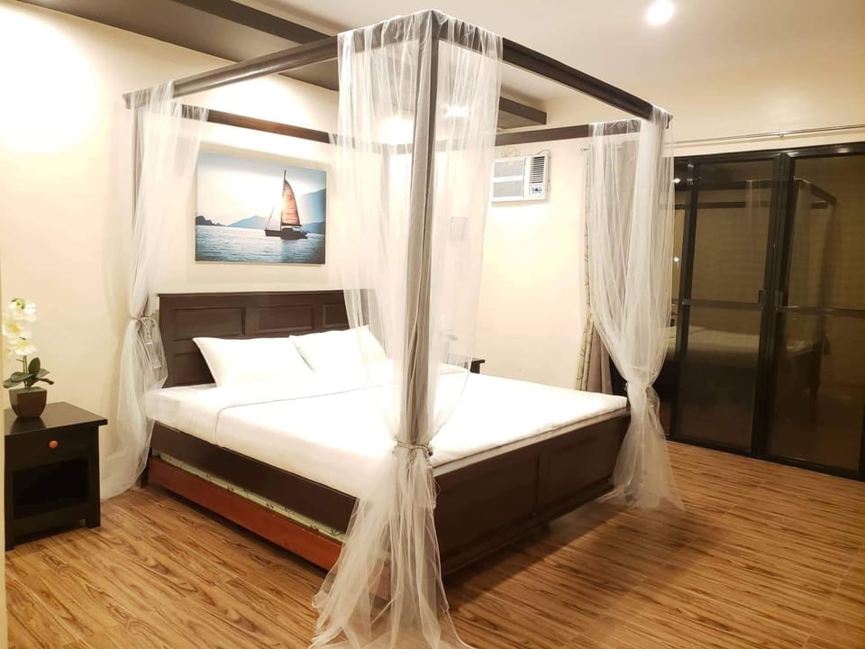 Premium bedding, desk, laptop workspace, soundproofing
