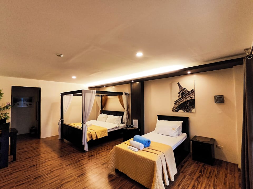 Premium bedding, desk, laptop workspace, soundproofing