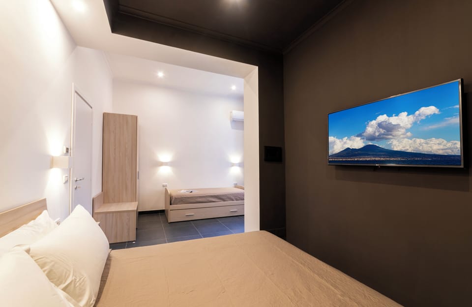 Comfort Room, Multiple Beds, Non Smoking | Minibar, in-room safe, desk, laptop workspace