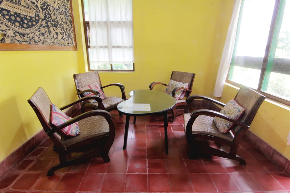 Standard Room, Shared Bathroom | Living area | 32-inch LCD TV with satellite channels, TV