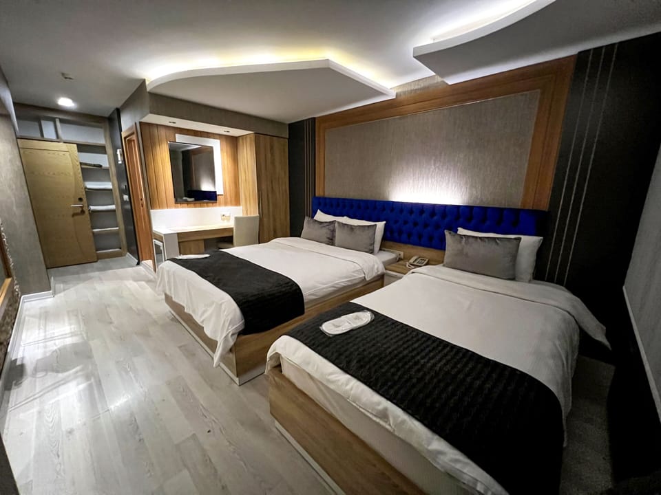 Standard Twin Room | Minibar (some free items), desk, iron/ironing board (on request)