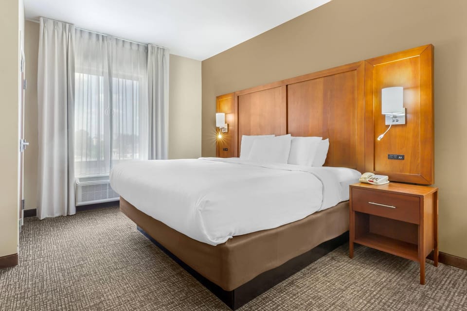 Suite, 1 King Bed, Accessible, Non Smoking | Desk, laptop workspace, blackout drapes, iron/ironing board