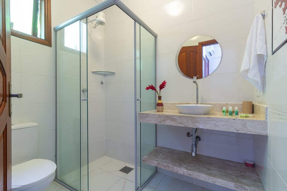 Premium Quadruple Room, Ocean View | Bathroom | Shower, free toiletries, hair dryer, towels