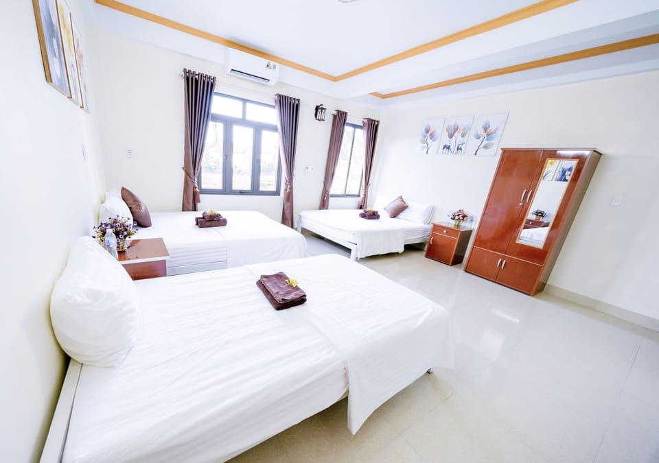 Family Room | Premium bedding, desk, blackout drapes, soundproofing